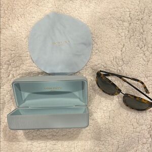 Karen Walker Gold Logo on Gray Case